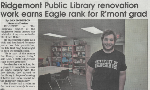 newspaper article of Levi Beiler in front of new activity room